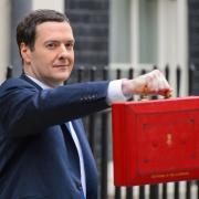Chancellor George Osborne outside 11 Downing Street ahead of his Budget speech