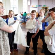 WORK: Sharon Seymour, from NHS County Durham and Darlington Foundation Trust, shows pupils bandaging and slinging techniques during a previous Foundation for Jobs event