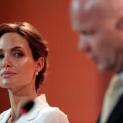Foreign Secretary William Hague and actress and UN special envoy Angelina Jolie make their opening speeches at the four-day Global Summit to End Sexual Violence in Conflict, in east London. Picture: Carl Court/PA Wire