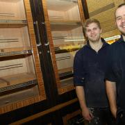 (from left) Former Darlington College apprentice Heath Chadwick, 37, now co-director of bespoke furniture makers Mark Asplin Whiteley Limited, of Whitby, with cabinet maker Tom Jenkinson, 25, of Egton in front of a bespoke Zebrano Oak and Walnut cigar