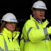 High-vis jacket? Hard hat? It must be David Cameron - visiting a new Marks and Spencer site in the West Midlands.