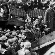 SPIRIT: British soldiers are assisted by the Royal Navy in June 1940, on their return to England after being evacuated from the beaches of Dunkirk Picture: PA