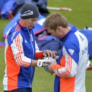CONCERN: Yorkshire and England's Joe Root has his hand checked after missing the first part of training yesterday at the Emirates Durham ICG. England v New Zealand preview - Pages 29 and 36. Picture: OWEN HUMPHREYS/PA