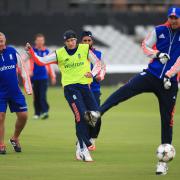 England's Joe Root shoots at goal past Steven Finn watched by England coach Paul Farbrace (left) during a game of football ahead of the nets session at The Emirates Old Trafford, Manchester. PRESS ASSOCIATION Photo. Picture date: Monday June 22, 2015.
