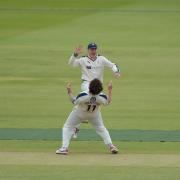 GREAT START: Ryan Sidebottom celebrates taking the wicket of Middlesex's Dawid Malan - his third wicket in his opening over - with Yorkshire team-mate Gary Ballance. Picture: MATT BRIGHT
