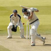 STAYING CLOSE: Middlesex's Nick Compton bats watched by Yorkshire's Andy Hodd at Lord's yesterday. Picture: PAUL HARDING/PA