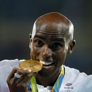 Great Britain's Mo Farah with his gold medal following the Men's 10,000m final at the Olympics Stadium on the eighth day of the Rio Olympics Games, Brazil. Picture: Owen Humphreys/PA Wire