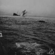 WATERY GRAVE: The sinking of an unknown Merchant Navy ship  Courtesy of the Imperial War Museum and Martin Spaldin