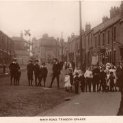 ABE'S ARCHIVE: A magnificent Edwardian postcard of the main street in Trimdon Grange. Abe Stewart put a cross probably where his grandmother lived close to the entrance to the colliery. We reckon the only building still standing is the Dovecote, the l