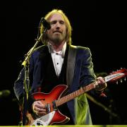 American musician, singer and songwriter Tom Petty, who has died aged 60, performing with the Heartbreakers on the Big Top stage at the Isle of Wight Festival. Picture: PA