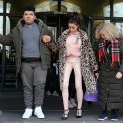 Katie Price (centre) with her son Harvey and her mother Amy leave Portcullis House in London after giving evidence to the Commons Petitions Committee where she called for online abuse to be made a specific offence. Picture:  Nick Ansell/PA Wire