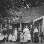 NEW HOME: The Kimber and Wardle families from Coffee Pot Row, Trimdon Colliery, standing outside their new home at 225 Roosevelt in a part of Louisville, Colorado, that is still known as 