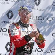 Max Coates celebrates a win in the Clio Cup.