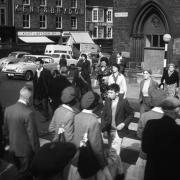 OVER THE ROAD: Hordes of shoppers crossing the Great North Road beneath Darlington Town Clock from Mike Neville's 1962 documentary.