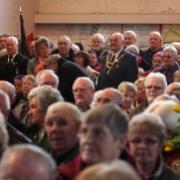 STANDING ROOM ONLY: Some of the 350 people who filled the church for the service