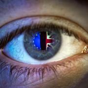 Reflections of a European flag (left) and Union flag, seen in a person's eye Picture: PA