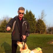 Dave Thomas and guide dog Hannah at Barnard Castle golf club