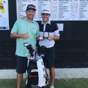 Callum Tarren and his caddy Landon Ewing celebrate qualifying for the US Open
