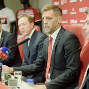 Jonathan Woodgate sits alongside Neil Bausor, Steve Gibson and Adrian Bevington during his introductory press conference