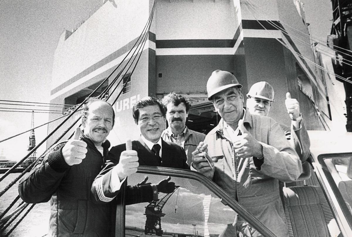 Handing over keys for the 1,000,000th Nissan car, date unknown