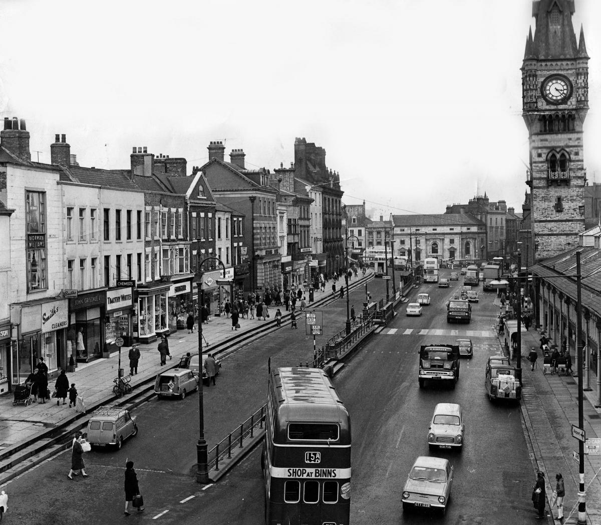 SHOP AT BINNS: So says the double decker turning on to High Row on April 7, 1966. Just above its roof, by the palisade is a line of deck chairs looking down onto the Great North Road