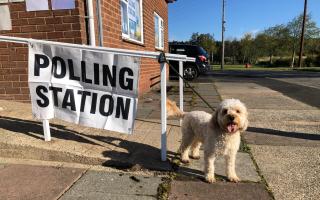 Reggie the two-year-old Cockapoo outside a polling station in Chester-le-Street, County Durham Picture: PA