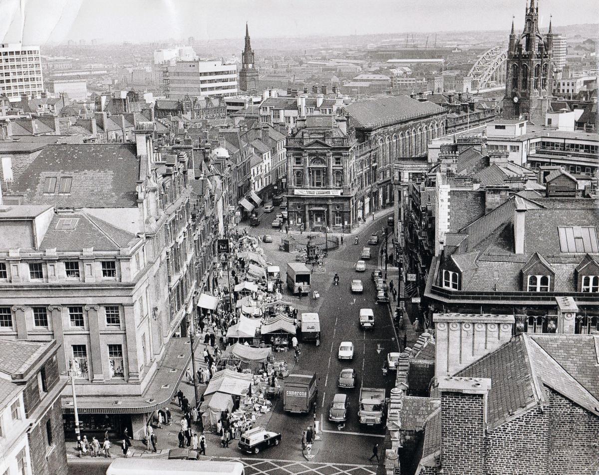 Bigg Market: The view over Bigg Market in 1968 shows that the street was much more traffic friendly than it is today, the Wall’s van that is stopped at a market stall is undoubtedly causing problems however