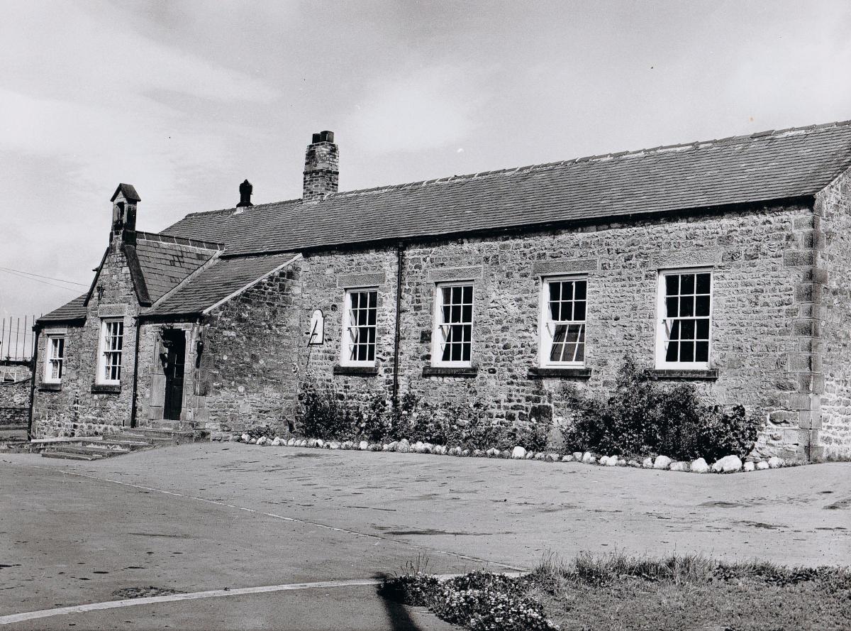 SCHOOL SUNDIAL: Ingleton’s first school was built in 1816. The school was rebuilt in 1875 and the current school was built elsewhere in 1967. All three schools included the sundial, clearly visible on this 1962 picture by the door, which is dated 1816