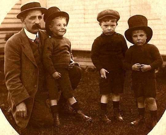HAUGHTON DYNASTY: The Marshalls have been one of Haughton's leading families for generations. Here is John William Marshall with three children, in strange hats, outside Haughton cricket pavilion