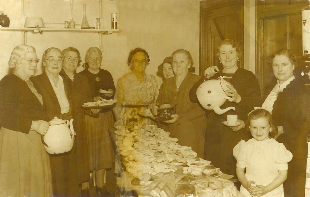GOING POTTY: Members of Haughton Women’s Institute at a tea party in the 1950s with extremely large teapots