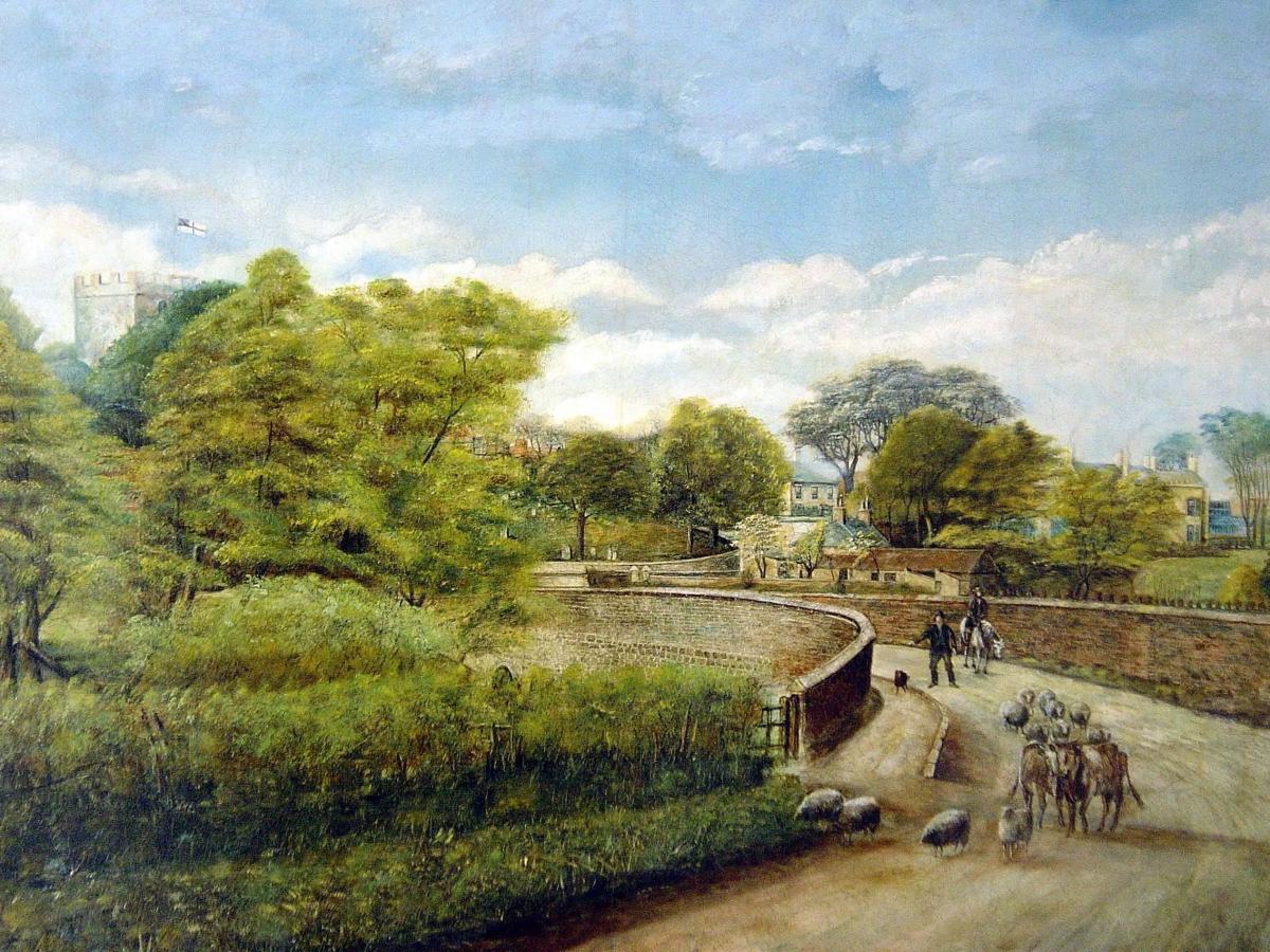 A Moscrop Allison's 1912 painting of the entrance to Haughton, over the old stone bridge over the Skerne which swung the road round to St Andrew's Church before leaving for Sadberge and Stockton along Haughton Green. Painting courtesy of Neil Wastell