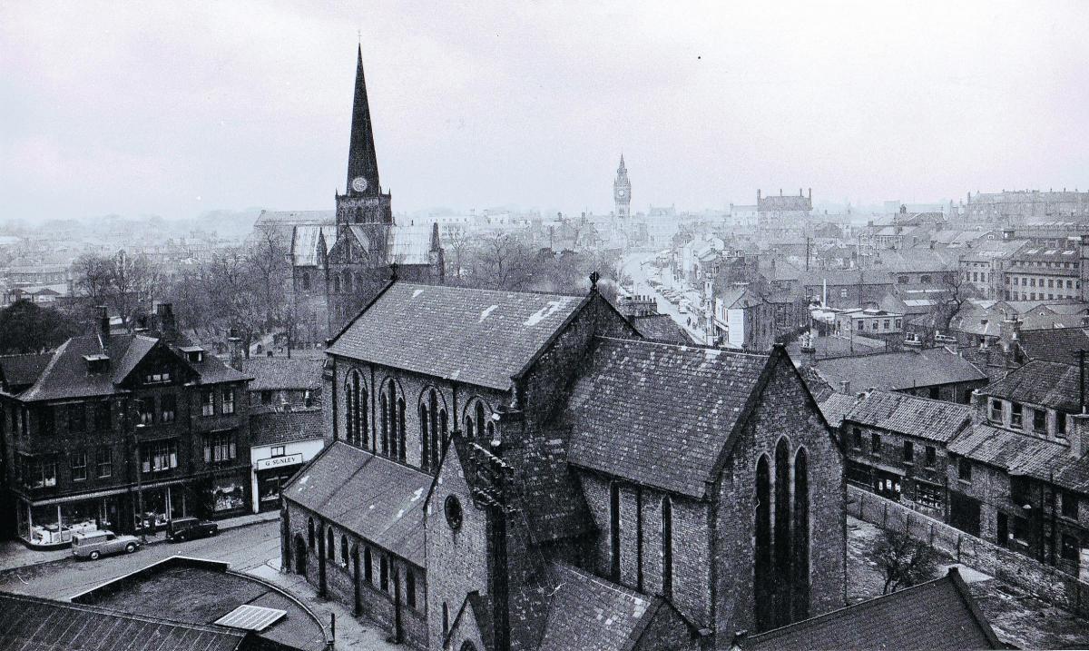 This is a splendid picture taken, we think , from the top of Darlington's Civic Theatre looking over St Hilda's Church to Tubwell Row in June 1962. Peases Mill is in the middle on the right of the picture, and at the bottom right are the old yards which o