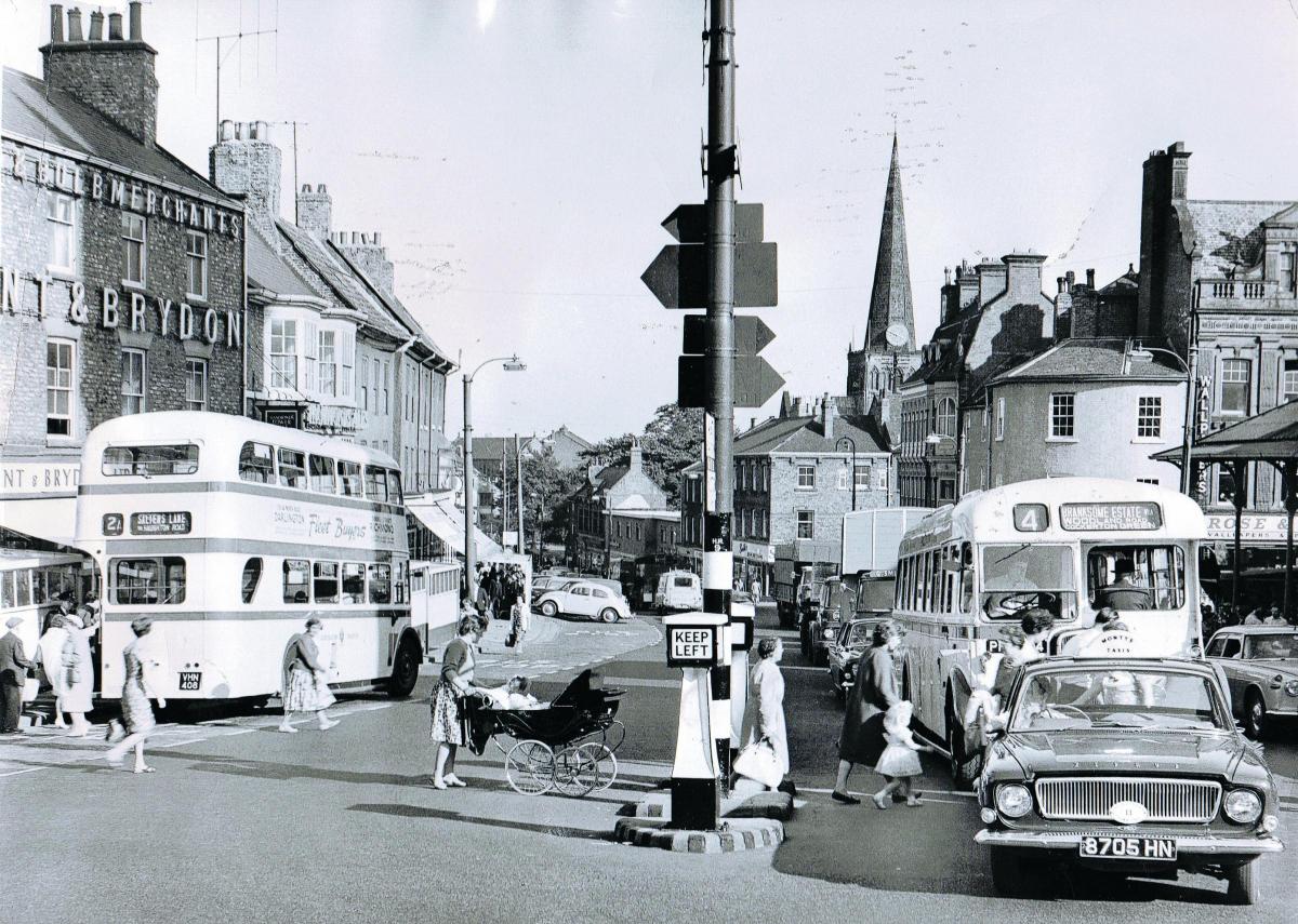 A Ford Zephyr belonging to Monty’s Taxis is turning out of Tubwell Row onto Low Row – which was then the Great North Road – on September 18, 1963