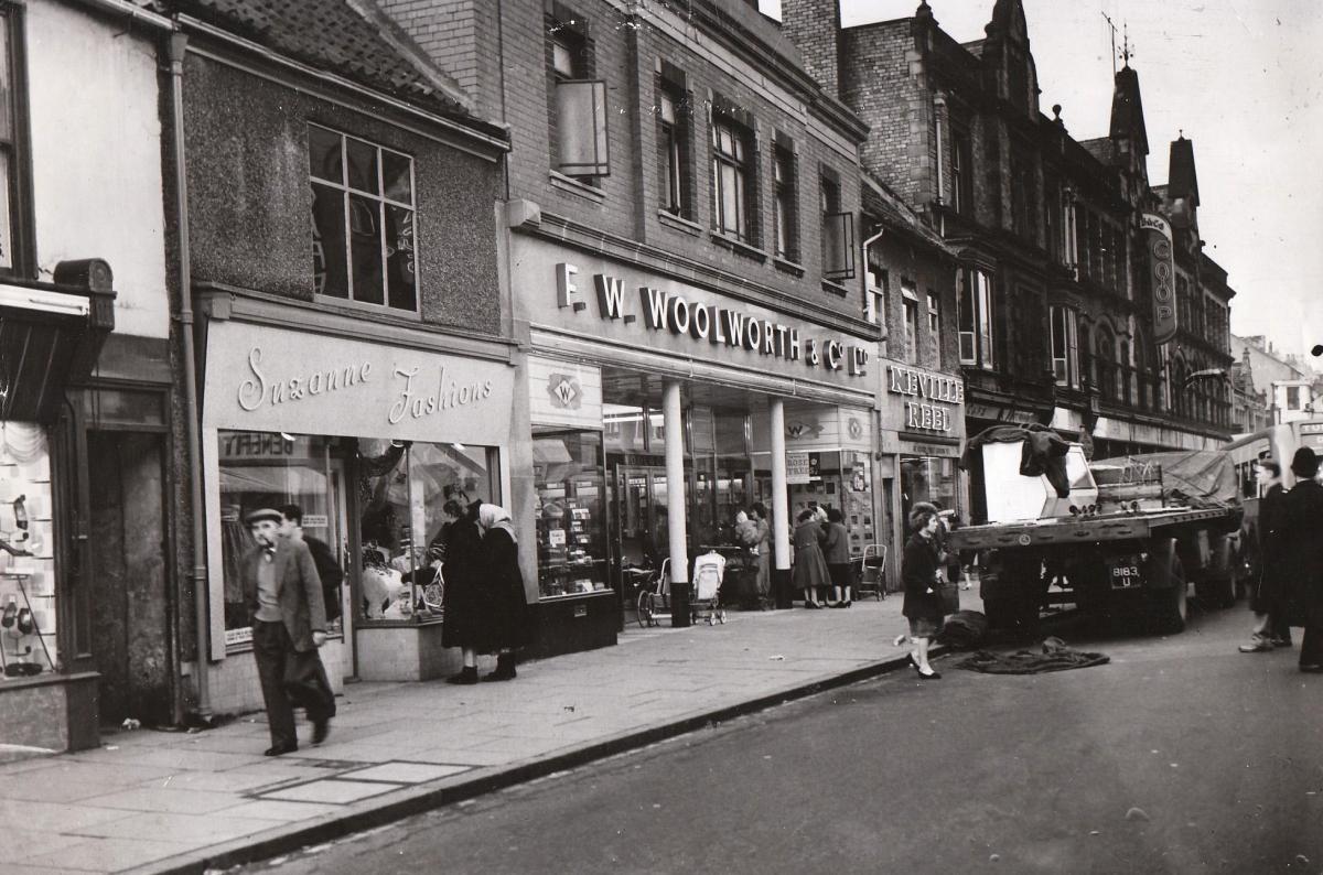 Newgate Street on November 2, 1960. The dark, Gothic building to the right of Woolies was the Bishop Auckland Co-operative store.