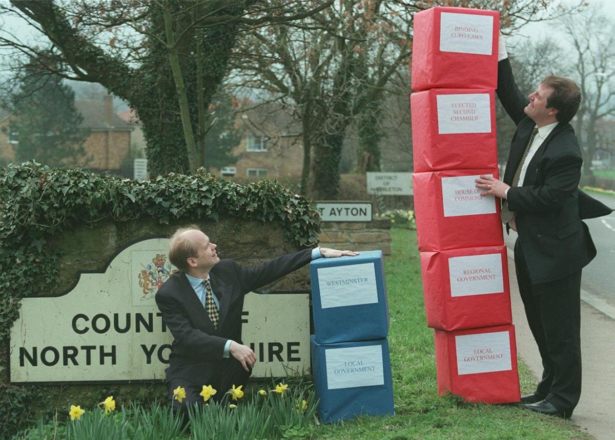 William Hague and Michael Bates in 1997 at the border of Redcar, Cleveland and Hambleton councils, near Great Ayton, demonstrating the supposed increase in bureaucrcy if Labour were to gain power