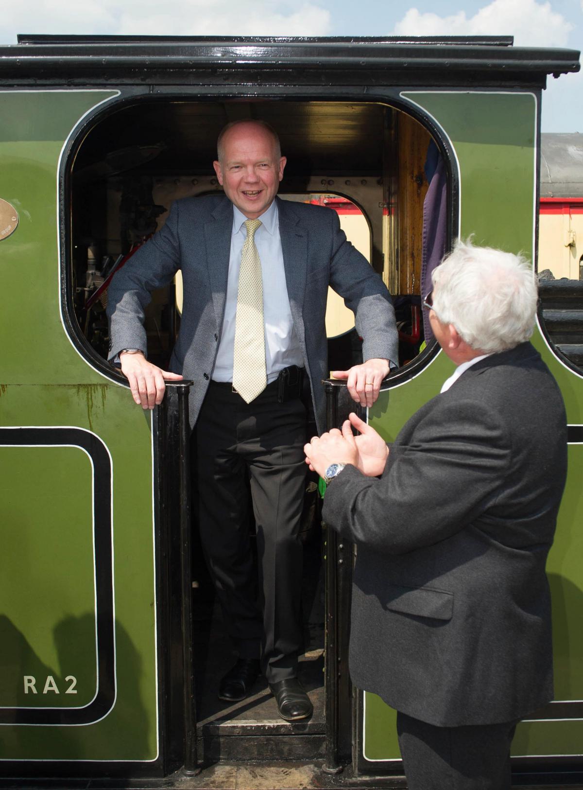 Foreign Secretary William Hague looks out from the footplate of a steam train as he visits Wensleydale Railway at Leeming Bar station as part of the events held to mark the line's tenth anniversary in 2013