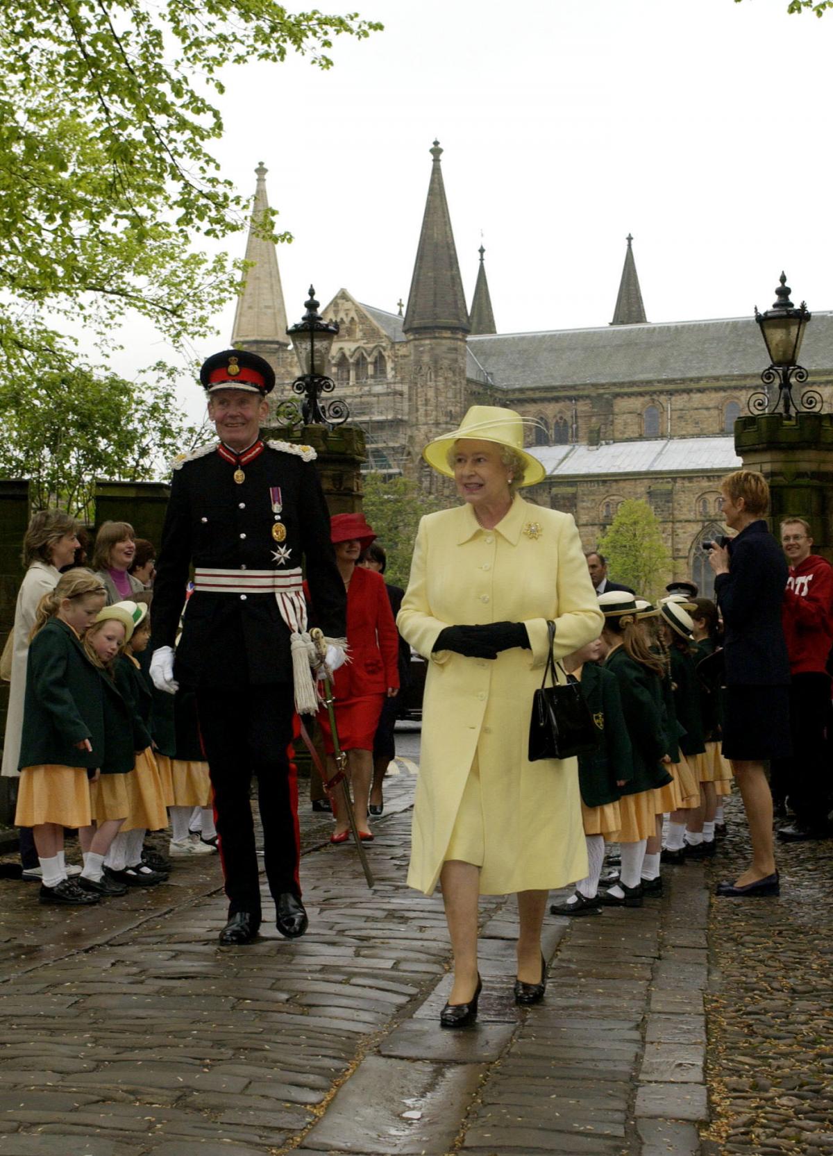 Queen Elizabeth II arrives at Durham Castle, County Durham, accompanied by the Lord Lieutenant of County Durham, Sir Paul Nicholson, on Wednesday 8 May, 2002