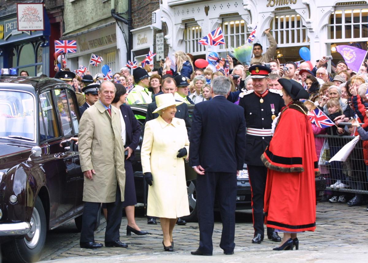 The Queen and the Duke of Edinburgh are greeted by the crowds as they arrive in Durham during the Queen's Golden Jubilee tour of the region