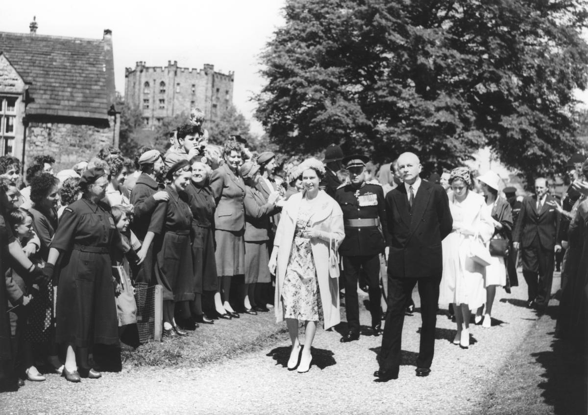 Bystanders flock to see Queen Elizabeth as she makes her way to Durham Cathedral in 1960