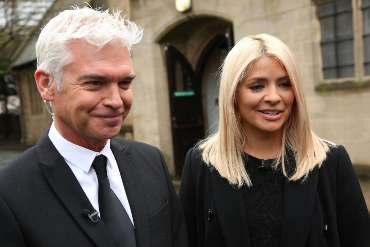 This Morning presenters Phillip Schofield and Holly Willoughby speak to the media Denise Robertson funeral in Sunderland