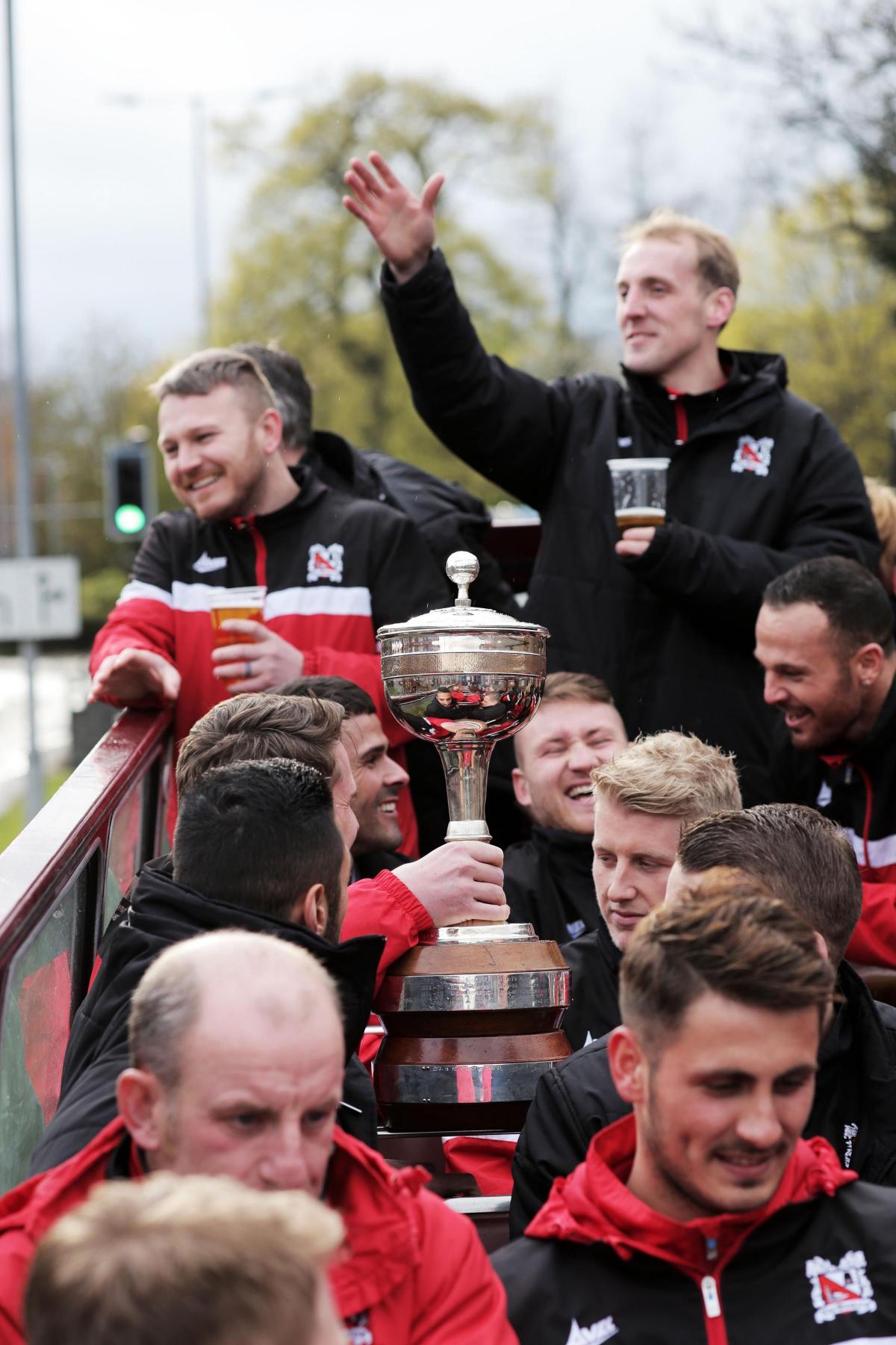 Darlington FC's open top bus victory home coming. Kev Burgess with the trophy.  Picture by Stuart Boulton.