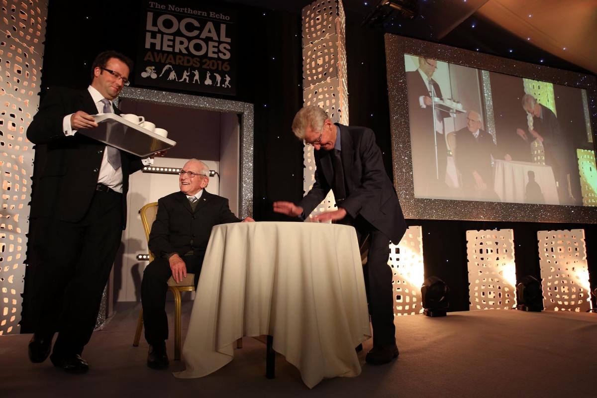 Albert Oldridge and Dave Lee of Haughton CC are honoured on stage with tea being made for them. Picture: CHRIS BOOTH