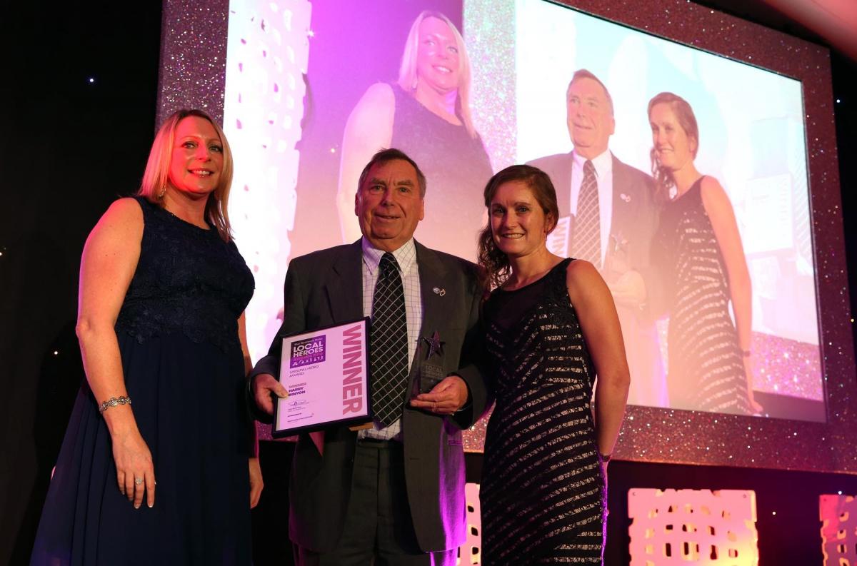 Winner of the Unsung Hero Award, Harry Binyon with Laura Hartshorne representing award sponsors Newcastle International Airport and runner Alyson Dixon. Picture: CHRIS BOOTH