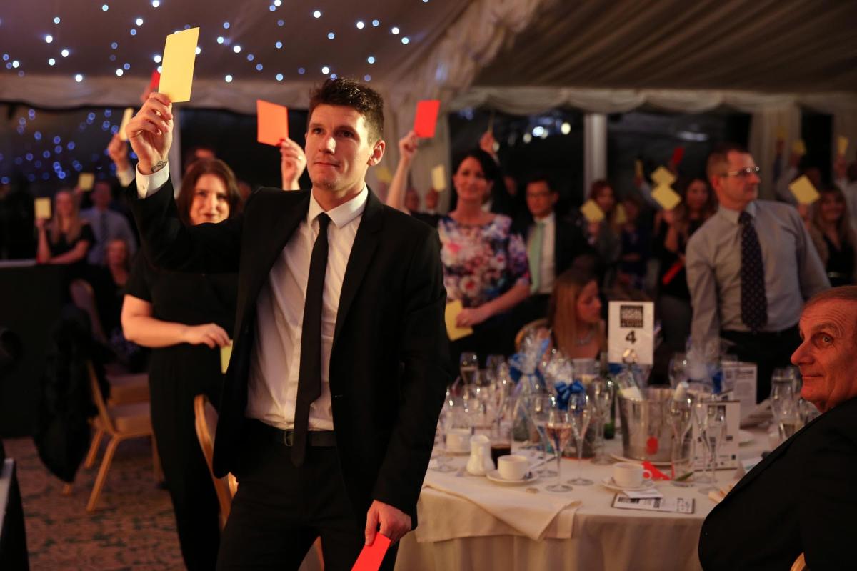 Guests play the Red Card Yellow Card game. Picture: CHRIS BOOTH
