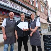 Kathryn Nicholson, centre, with head of retail Kathryn Hay and master butcher Alan Kennedy