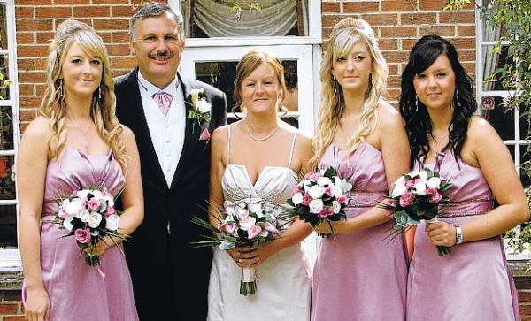 DAY TO REMEMBER: Kenneth and Karen Porter at their wedding at Durham Register Office, with Mrs Porter’s daughters, Catherine, left, Emma, second right, and Sarah, right
