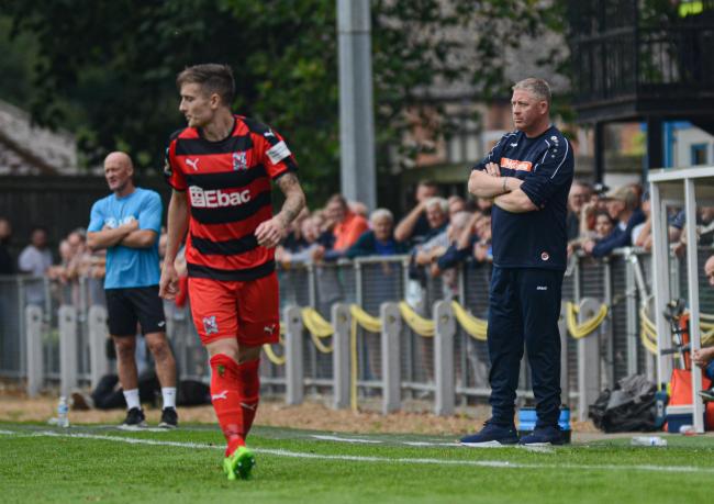 Darlington manager Alun Armstrong and Jarrett Rivers, scorer of the first Quakers goal on Saturday