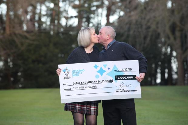 The Northern Echo: John and Allison McDonald celebrate their Lotto win. Picture: Danny Lawson / PA Wire