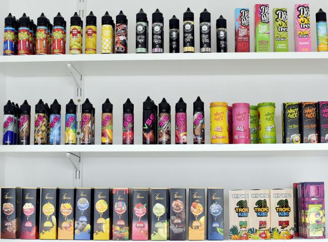 Vaping liquid products on a shop shelf. Picture: PA