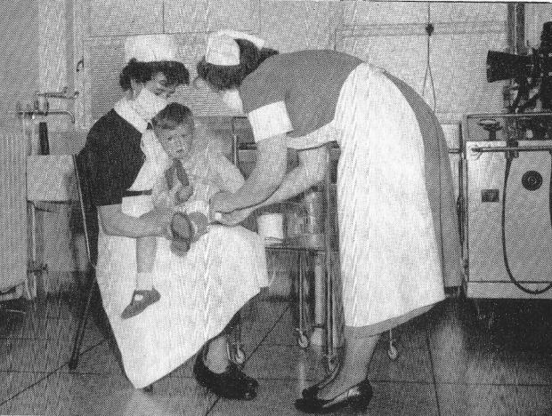 The Northern Echo: Nurses in facemasks at the Memorial learn in the late 1950s to treat an injured boy